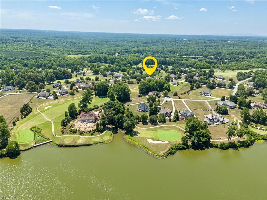 View of house and hole numbers 7 & 8 - 163 Cleek Drive, Summerfield NC 27358, Summerfield