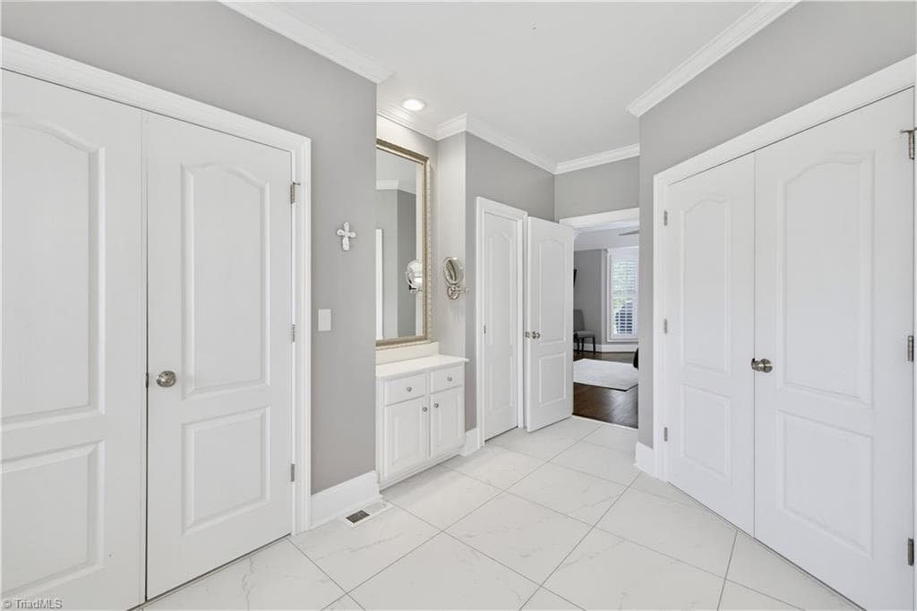 His and her closets in the primary bath - 163 Cleek Drive, Summerfield NC 27358, Summerfield