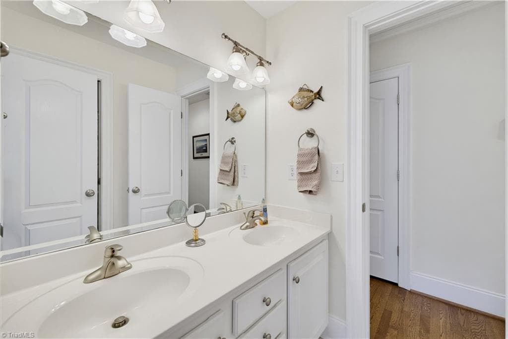 Bathroom attached to bedroom 3 - 163 Cleek Drive, Summerfield NC 27358, Summerfield