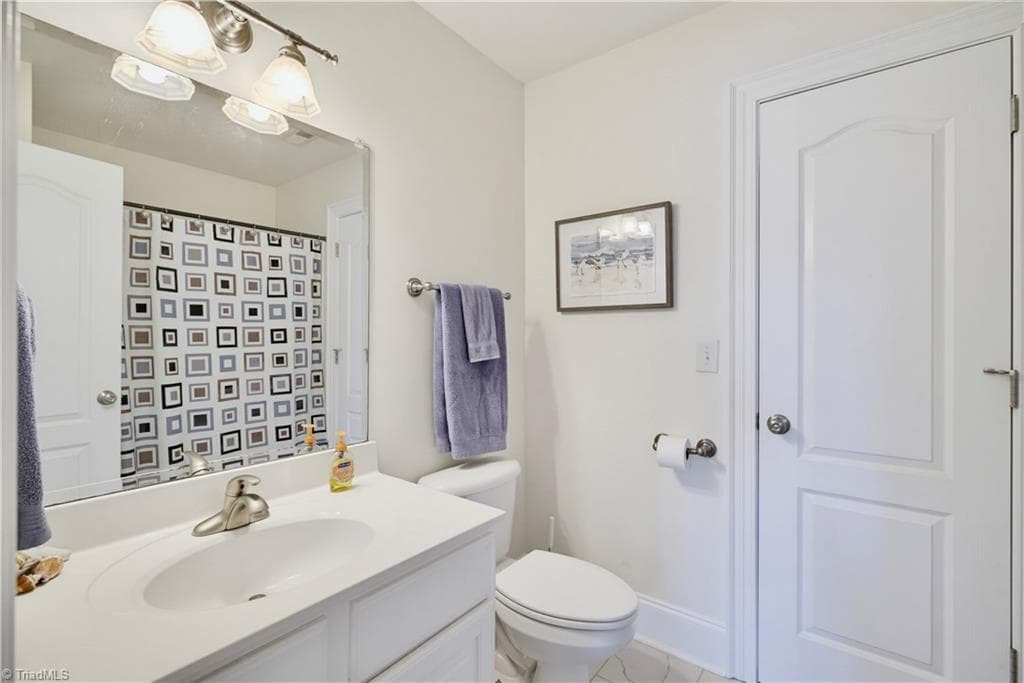 Bathroom attached to Bedroom 2 - 163 Cleek Drive, Summerfield NC 27358, Summerfield