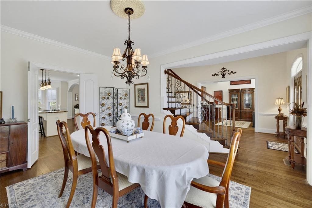 Another view from formal Dining Room and stairway leading to second level - 163 Cleek Drive, Summerfield NC 27358, Summerfield