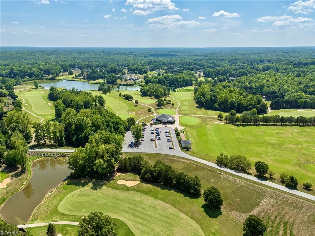 Additional view of clubhouse and beautiful golf course. - 163 Cleek Drive, Summerfield NC 27358, Summerfield