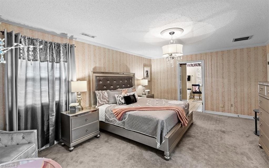 The owner wuite is large enough for a seating area alongside the bedroom furniture. - 6352 Turnpike Road, High Point NC 27263, High Point