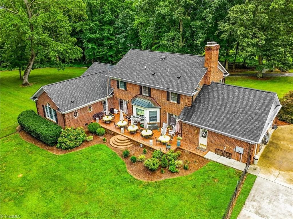 Aerial view of the rear of the home without the additional ADU/garage. - 6352 Turnpike Road, High Point NC 27263, High Point