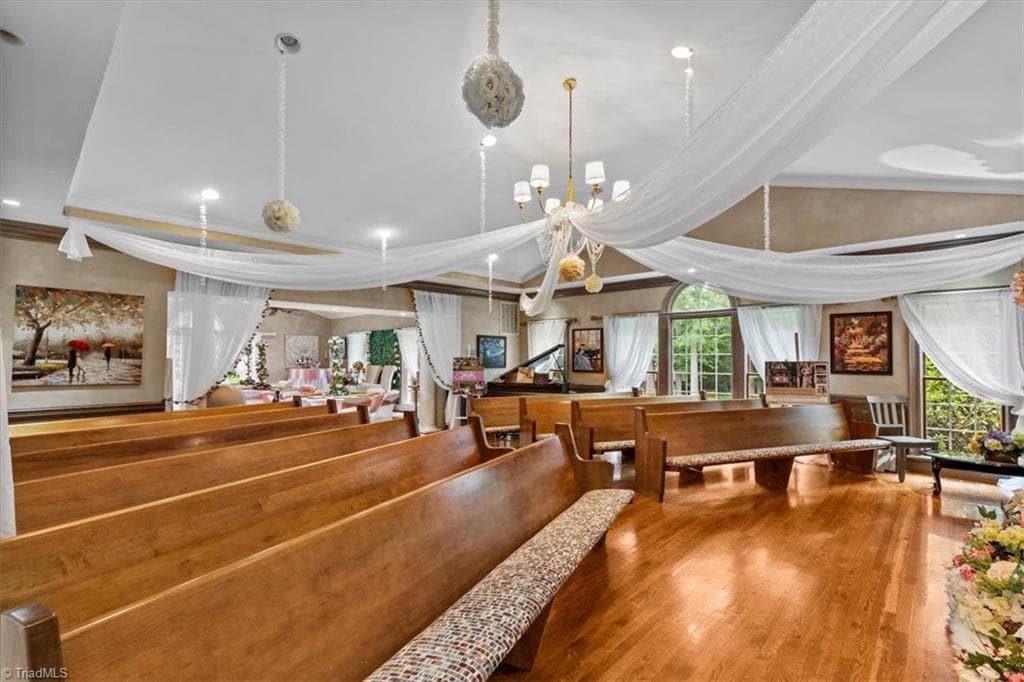 The great room is currently set for events or religious gatherings offers a grand living space or functional event space, you choose. - 6352 Turnpike Road, High Point NC 27263, High Point