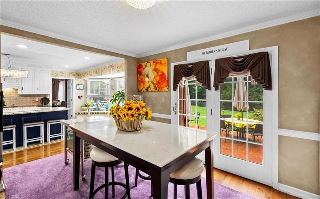The dining room or breakfast room adjacent to the kitchen is excellent for casual or formal dining. - 6352 Turnpike Road, High Point NC 27263, High Point
