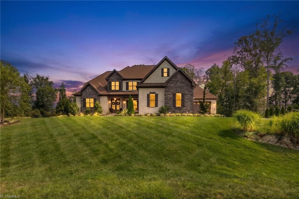 Twilight views of this amazing home! - 5503 Briardenn Court, Summerfield NC 27358, Summerfield
