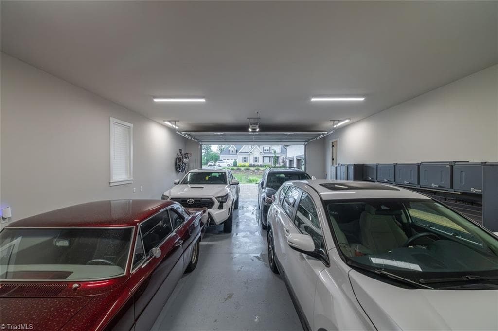Additional garage for 4 cars! This home has a total of 7 garage spaces! - 5503 Briardenn Court, Summerfield NC 27358, Summerfield