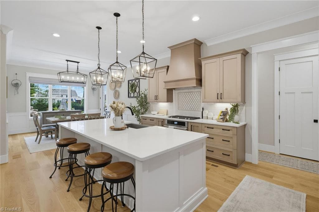Large island with Quartz countertops. - 5503 Briardenn Court, Summerfield NC 27358, Summerfield