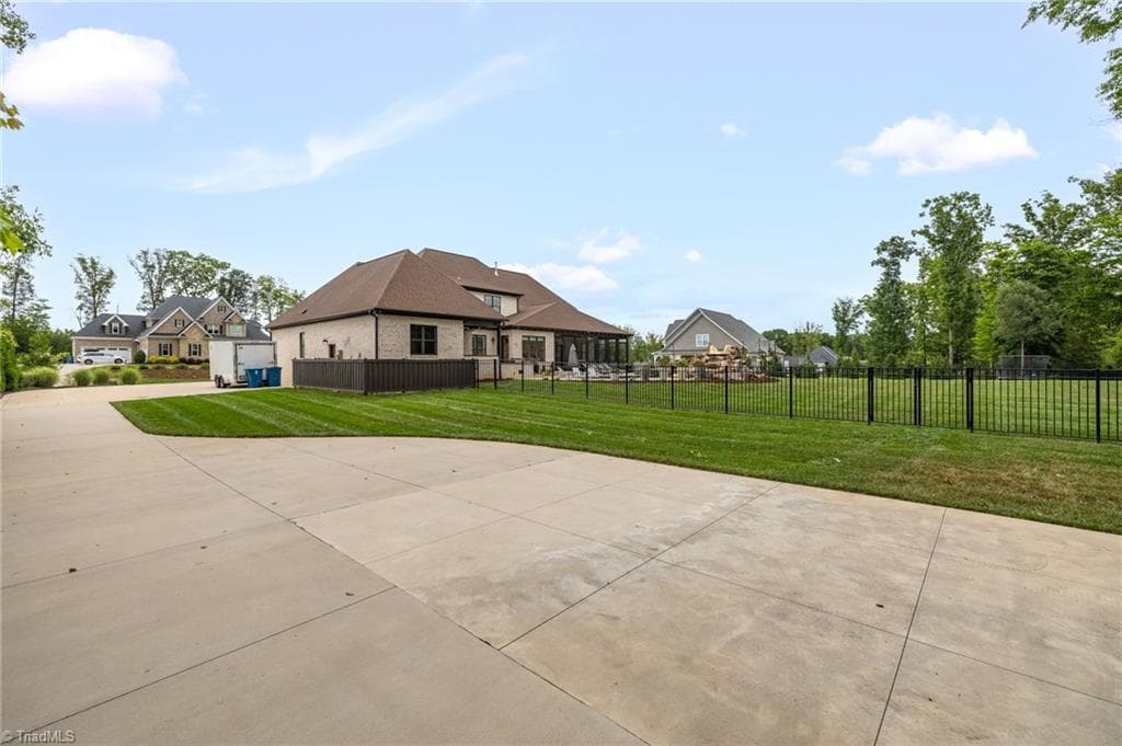 Driveway expanded and a reinforced concrete pad was installed for a future detached building or garage. - 5503 Briardenn Court, Summerfield NC 27358, Summerfield