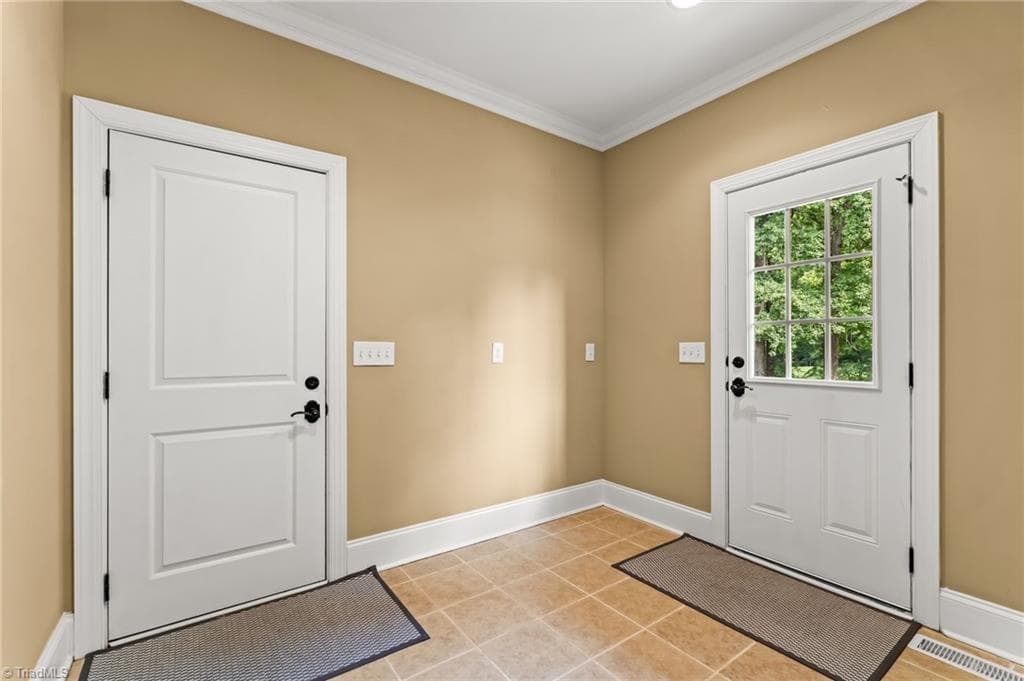 Mud room - there is plenty of space to build a drop zone - 6202 Herons Nest Court, Oak Ridge NC 27310, Oak Ridge