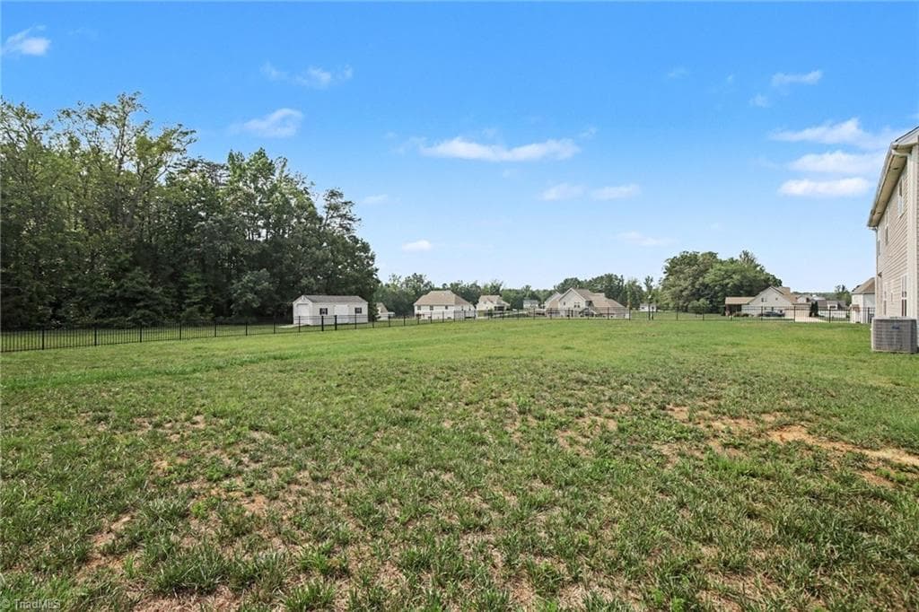 Fenced, flat backyard with storage building - 210 Marguerite Court, Reidsville NC 27320, Reidsville
