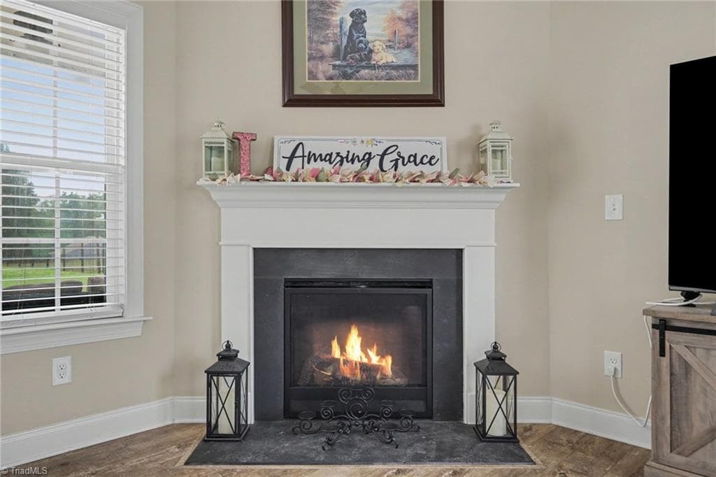 Fireplace with gas logs - 210 Marguerite Court, Reidsville NC 27320, Reidsville