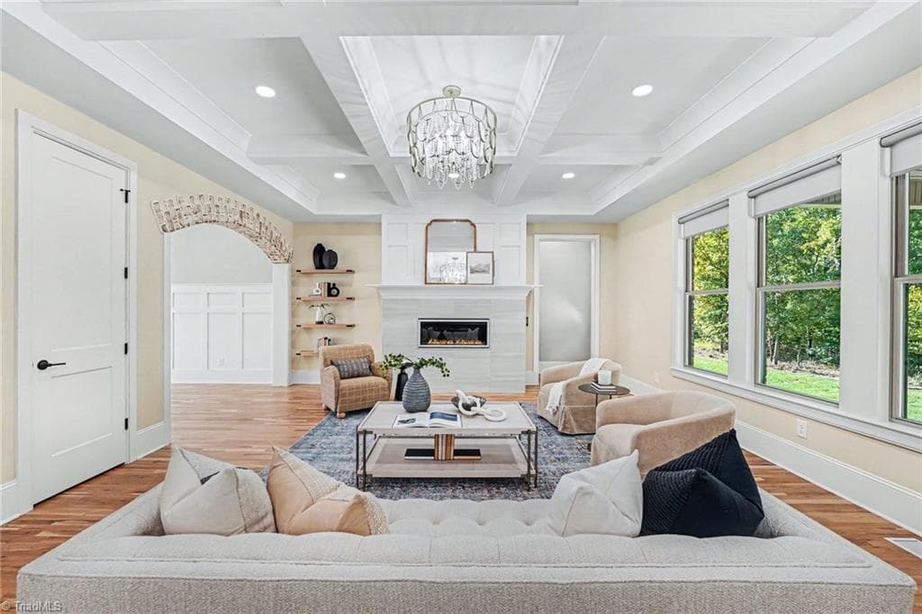 The heart of the home. A beautifully designed gathering space where the living room and gourmet kitchen flow seamlessly together. - 1477 Cappoquin Way, Burlington NC 27215, Burlington