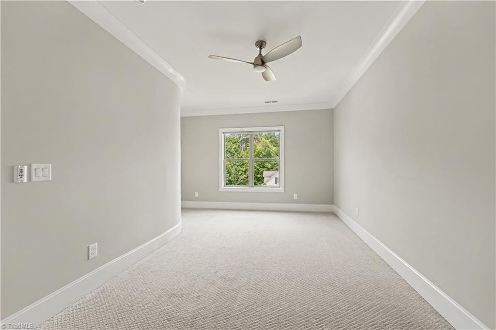Half bath located between the adjoining bedrooms, featuring convenient access to the shared shower area. - 1477 Cappoquin Way, Burlington NC 27215, Burlington