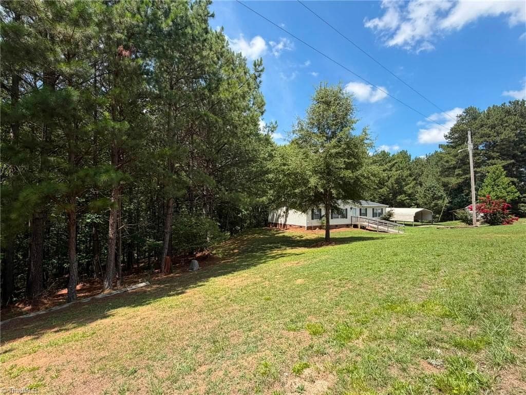 Manufactured Home at 1042 Wells Creek Road, Madison NC 27025, Madison, photo 11 of 96