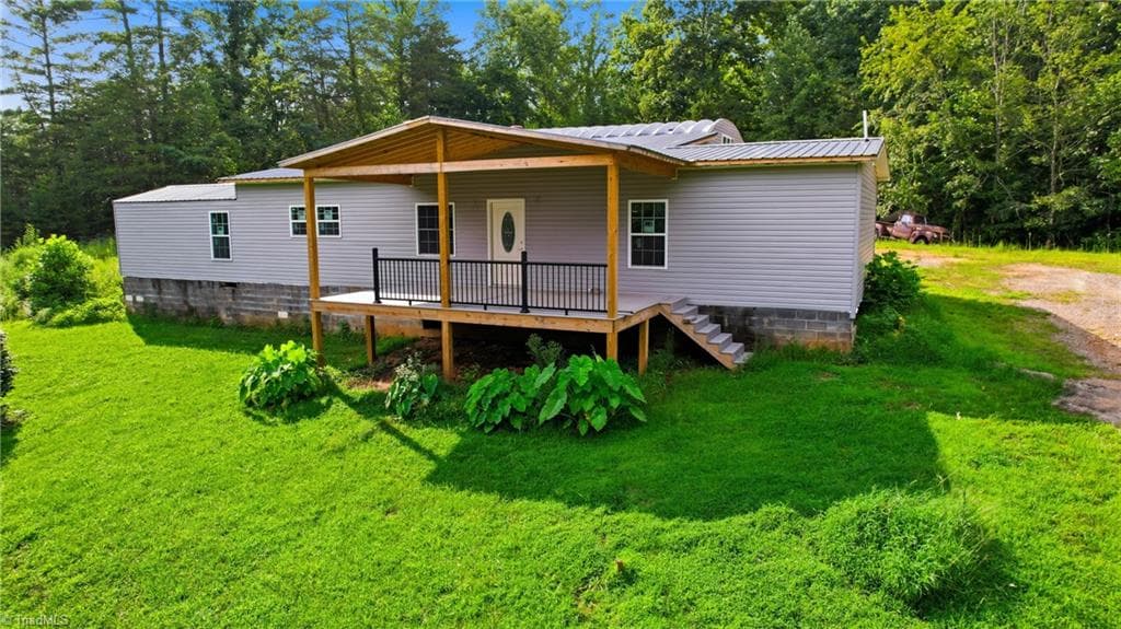 Manufactured Home at 209 Bruno Lane, Boomer NC 28606, photo 3 of 40