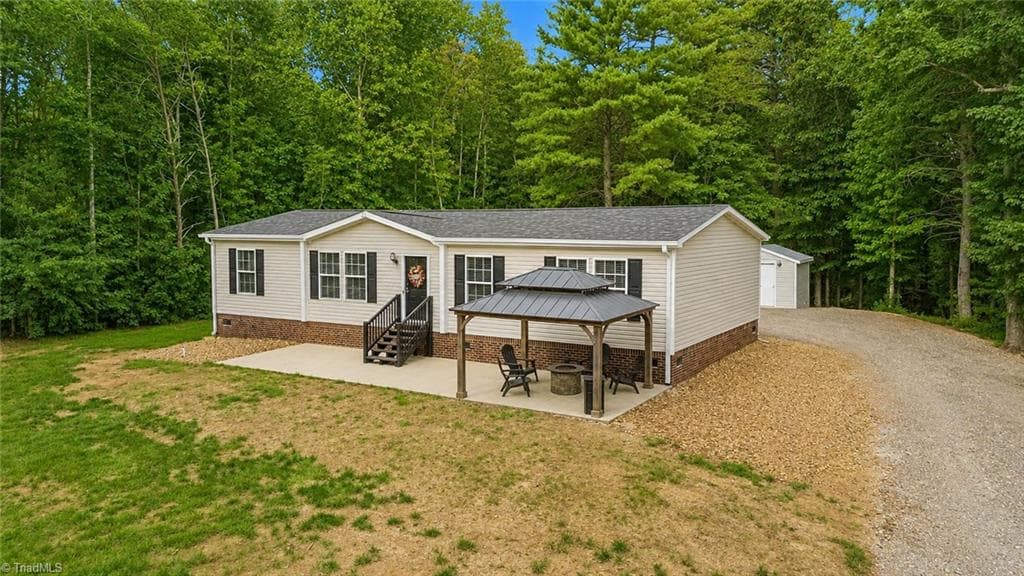 Manufactured Home at 1930 Elk Shoals Church Loop, Stony Point NC 28676, photo 3 of 38