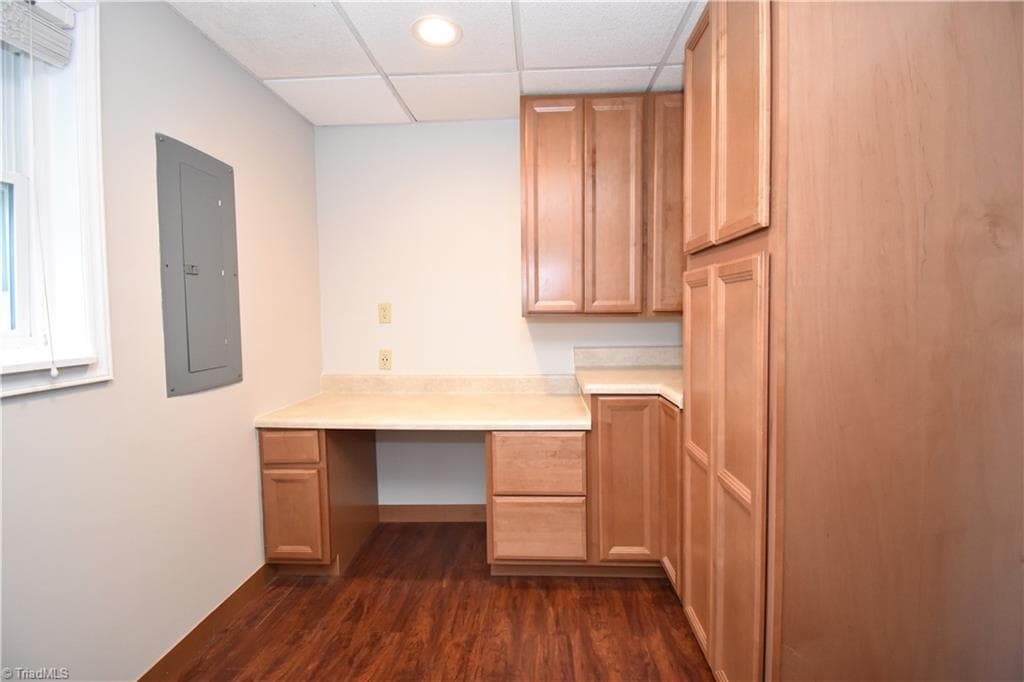 The original laundry room also features a built in office and additional storage. - 8546 Hudson-James Road, Summerfield NC 27358, Summerfield
