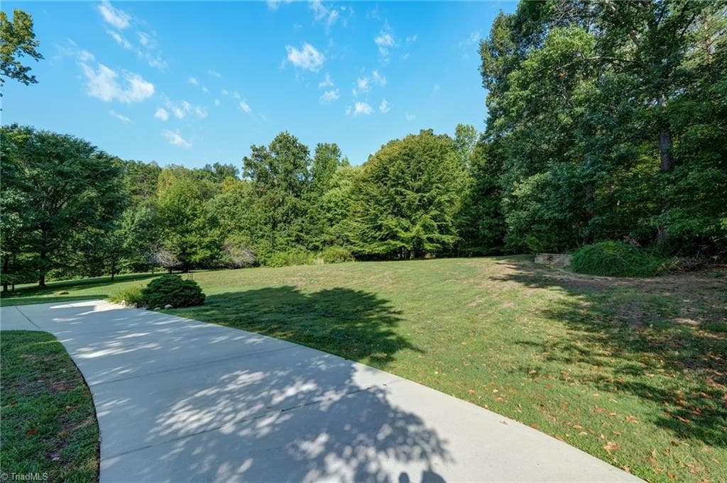 Separate driveway to basement - 4404 Liguria Court, Summerfield NC 27358, Summerfield