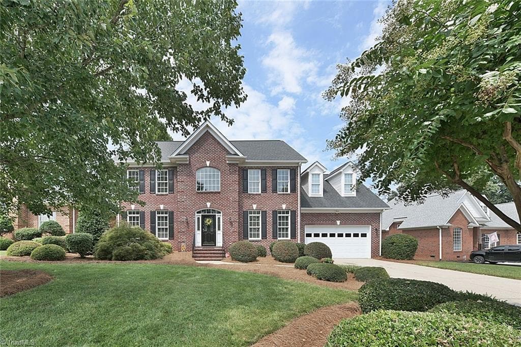 This beautifully maintained home offers three spacious levels of living and professional landscaping that creates exceptional curb appeal. Welcome home! - 1101 Clyde Edgerton Drive, Kernersville NC 27284, Kernersville