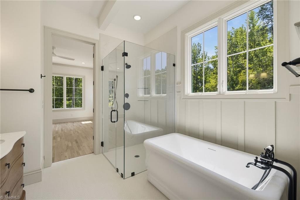 Primary bathroom with separate shower and tub. - 568 N Bunker Hill Road, Oak Ridge NC 27310, Oak Ridge