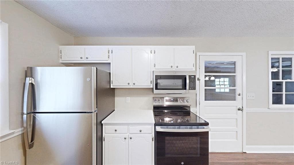 New Fridge, New Range and new Microwave all appliances come with a 3 year warranty - 1804 Ramsey Road, Kernersville NC 27284, Kernersville