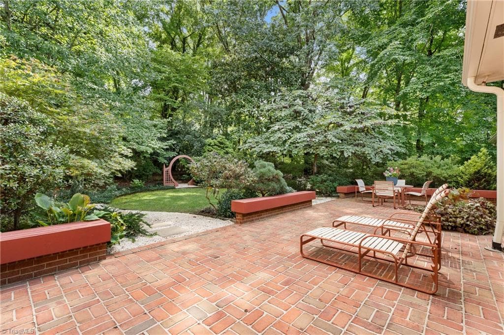 Relaxing patio surrounded by beautiful landscaping - 2822 Lazy Lane, Winston-Salem NC 27106, Winston-Salem