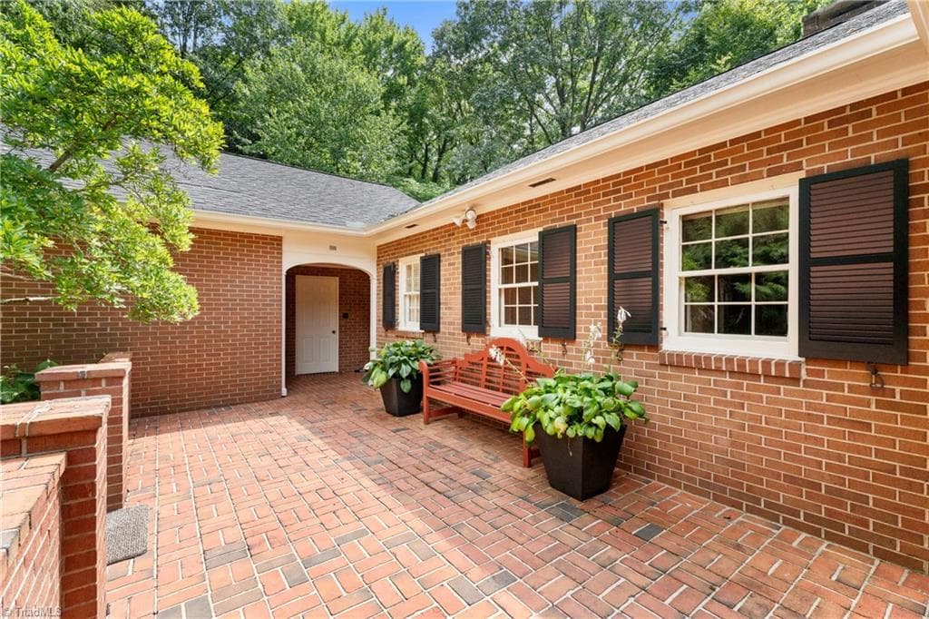 Side patio between breakfast area and garage - 2822 Lazy Lane, Winston-Salem NC 27106, Winston-Salem