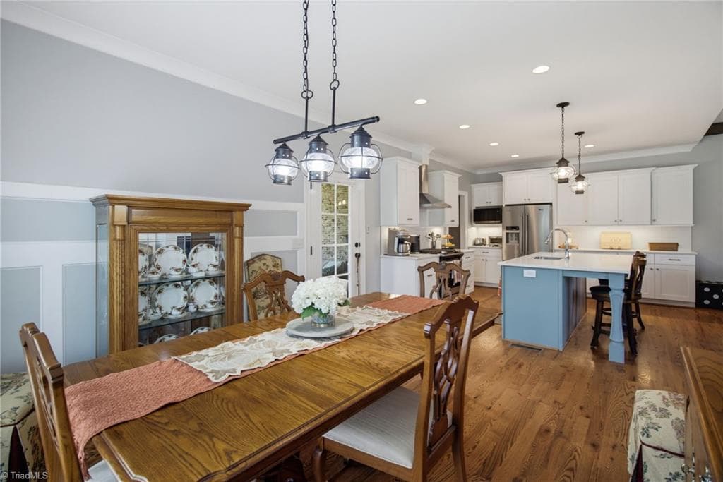 Dining area and kitchen in this open main level space - 428 Wentworth Drive, Winston-Salem NC 27107, Winston-Salem