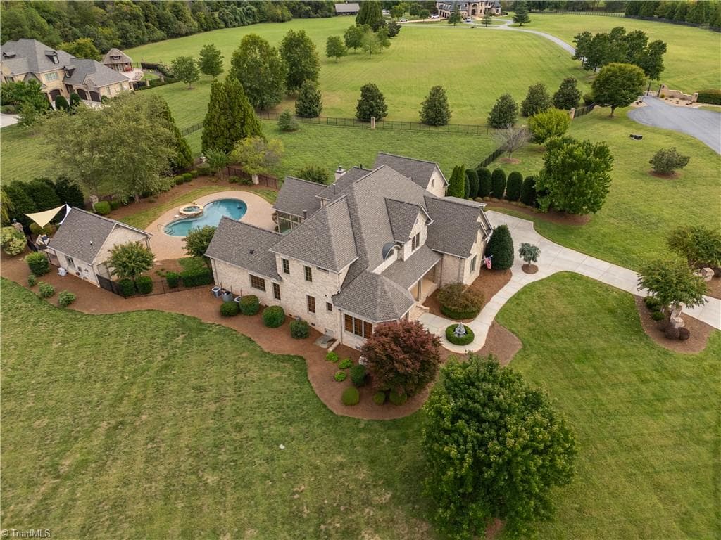 Where everyday living feels like your own private estate! - 7404 Hadleigh Court, Oak Ridge NC 27310, Oak Ridge