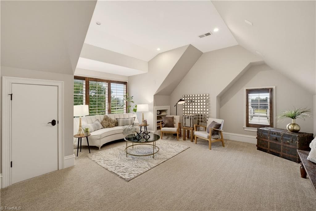 Versatile Bonus Room can be used for a playroom, media room, or a teen hangout area - 7404 Hadleigh Court, Oak Ridge NC 27310, Oak Ridge
