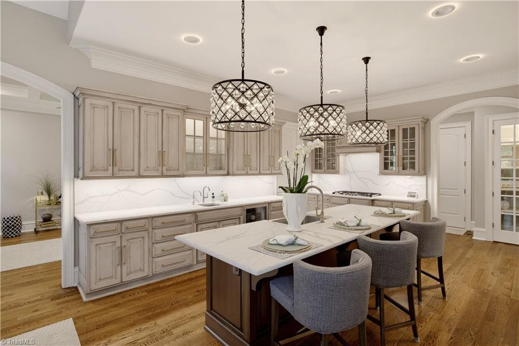 Picture your family gathered around the island. This home was made for entertaining! - 7404 Hadleigh Court, Oak Ridge NC 27310, Oak Ridge