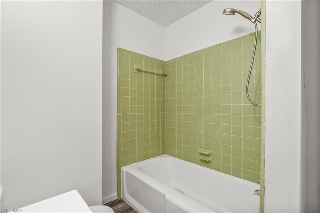 Hall bath with tub and shower - 5822 RuralView Road, Gibsonville NC 27249, Gibsonville