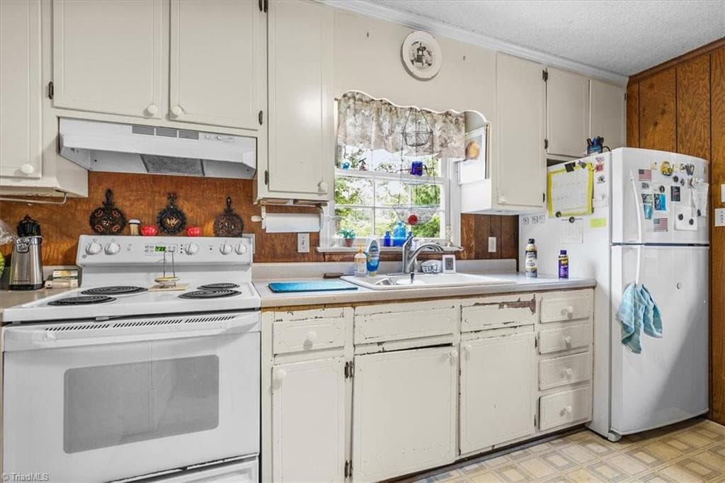 Original kitchen with newer appliances - 5822 RuralView Road, Gibsonville NC 27249, Gibsonville