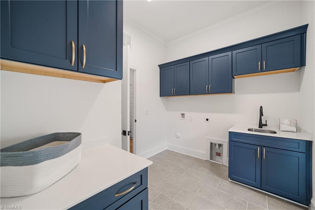 Amazing cabinet space and sink in the laundry room - 3667 Grey Oaks Court, Winston-Salem NC 27104, Winston-Salem