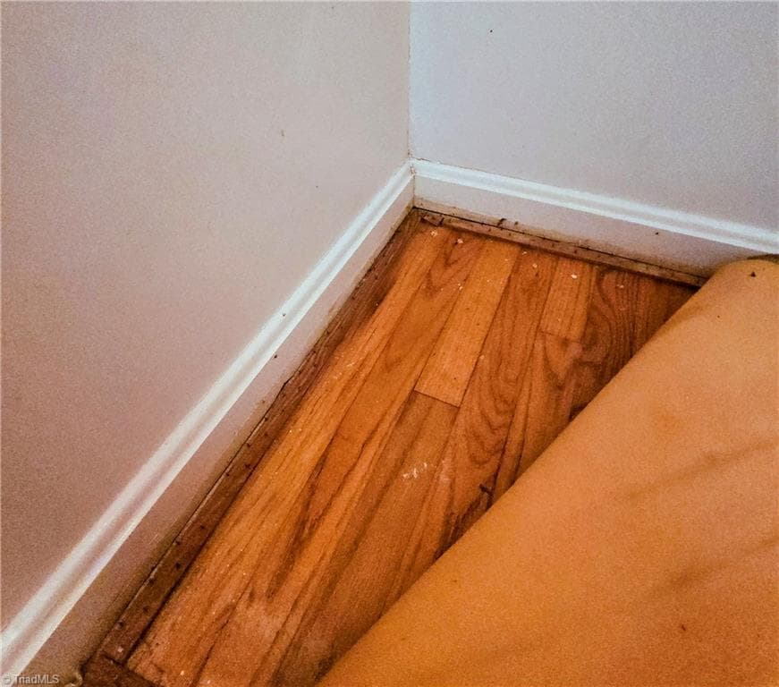 Hardwood floors underneath living room carpet! - 171 Idlewild Drive, Randleman NC 27317, Randleman