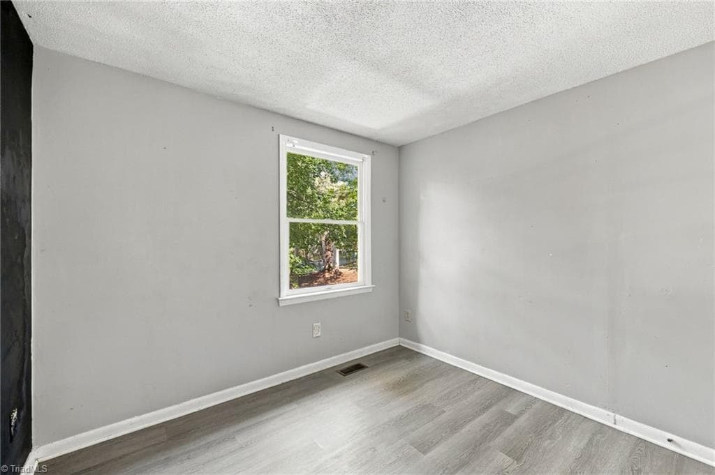 Third bedroom with ample closet space. - 5500 Richland Street # A, Greensboro NC 27409, Greensboro
