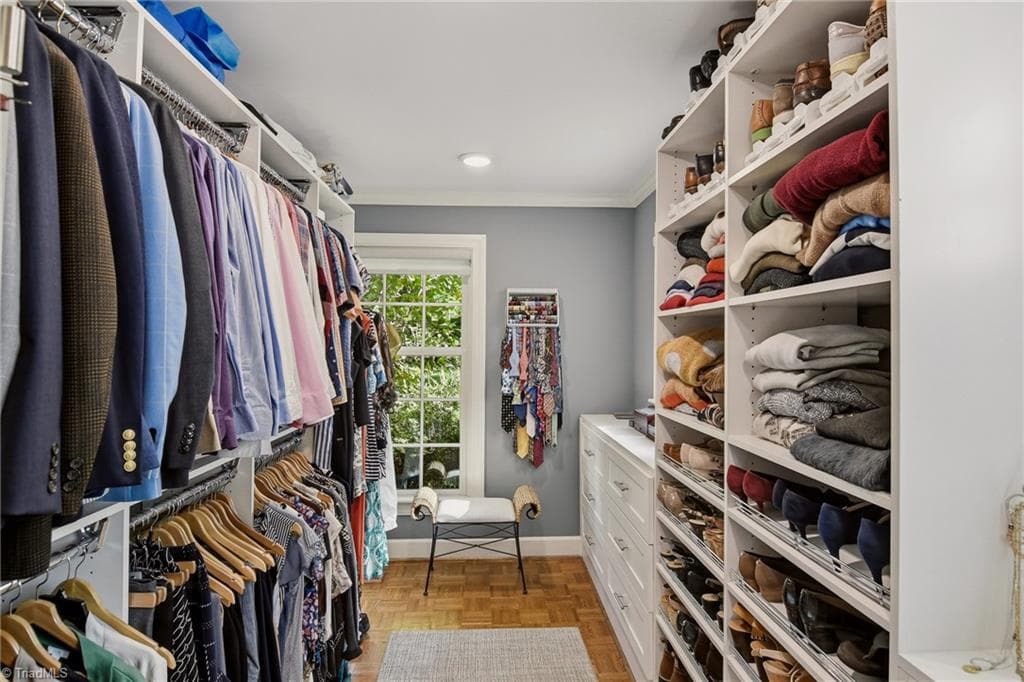 Walk-in closet with built-in storage. - 2862 Robinhood Road, Winston-Salem NC 27106, Winston-Salem