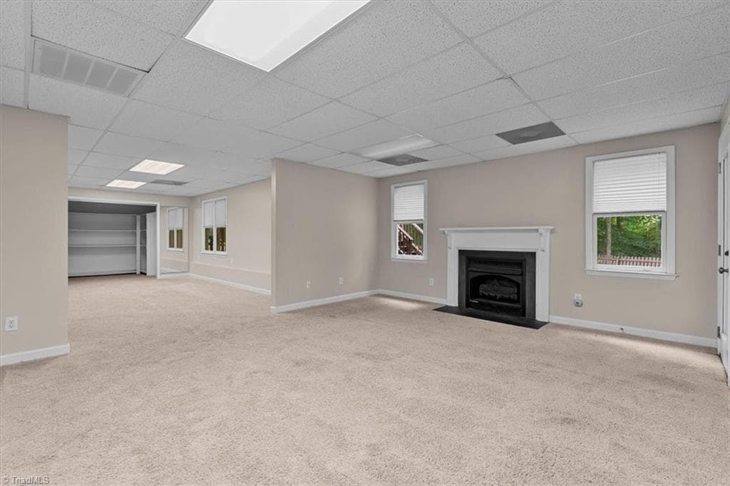 Large Basement Living Room with gas fireplace and game/flex room - 6101 Trotter Ridge Road, Summerfield NC 27358, Summerfield