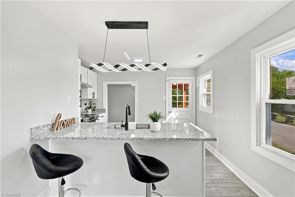 Kitchen with granite countertops - 1113 Benjamin Benson Street, Greensboro NC 27406, Greensboro