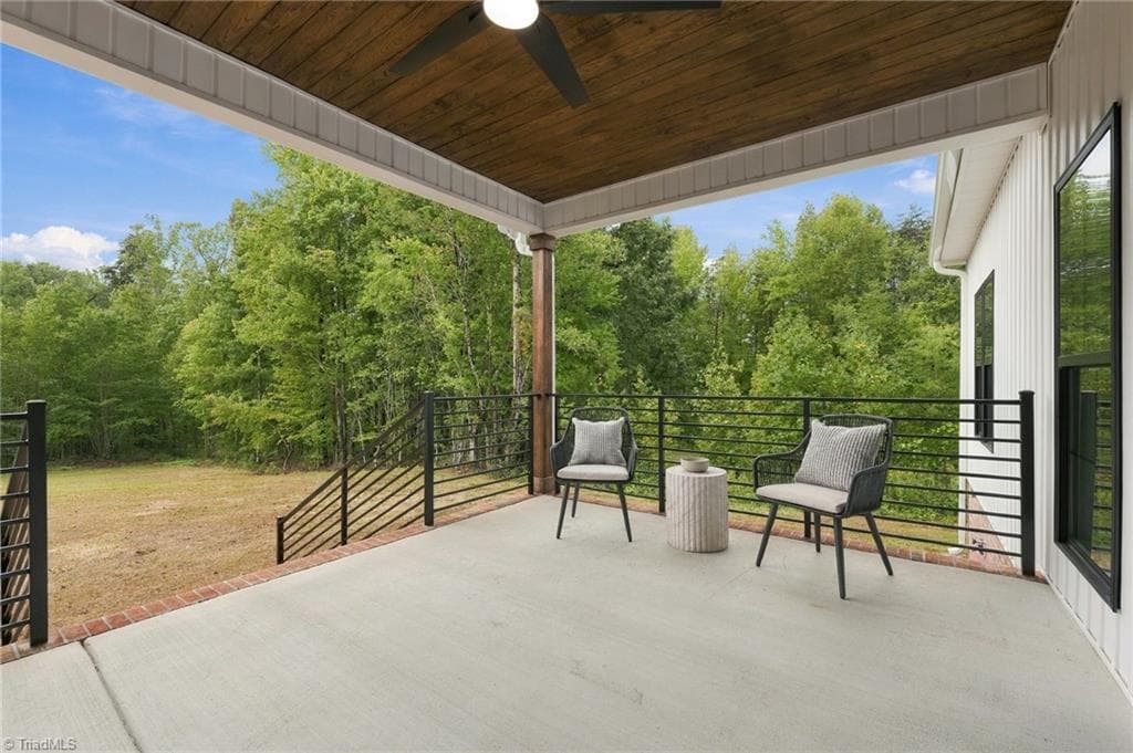The perfect setting for relaxed gatherings while overlooking the private wooded surroundings. Green Views!!! - 224 Pearson Farm Road, Summerfield NC 27358, Summerfield