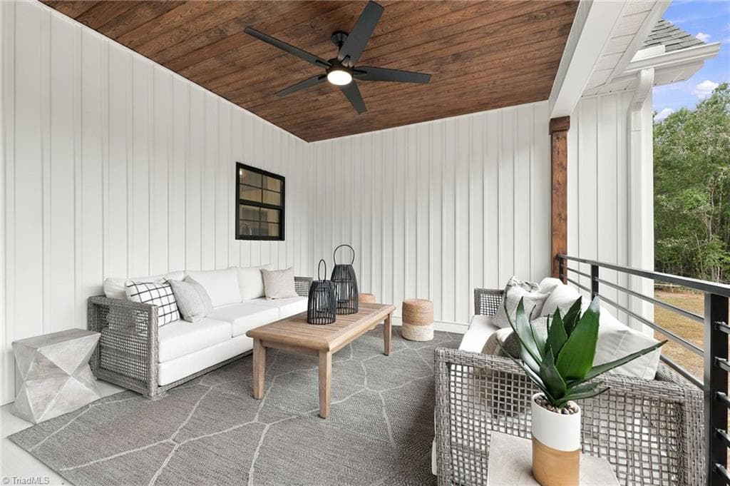 The generous scale effortlessly accommodates multiple seating and entertaining areas. - 224 Pearson Farm Road, Summerfield NC 27358, Summerfield