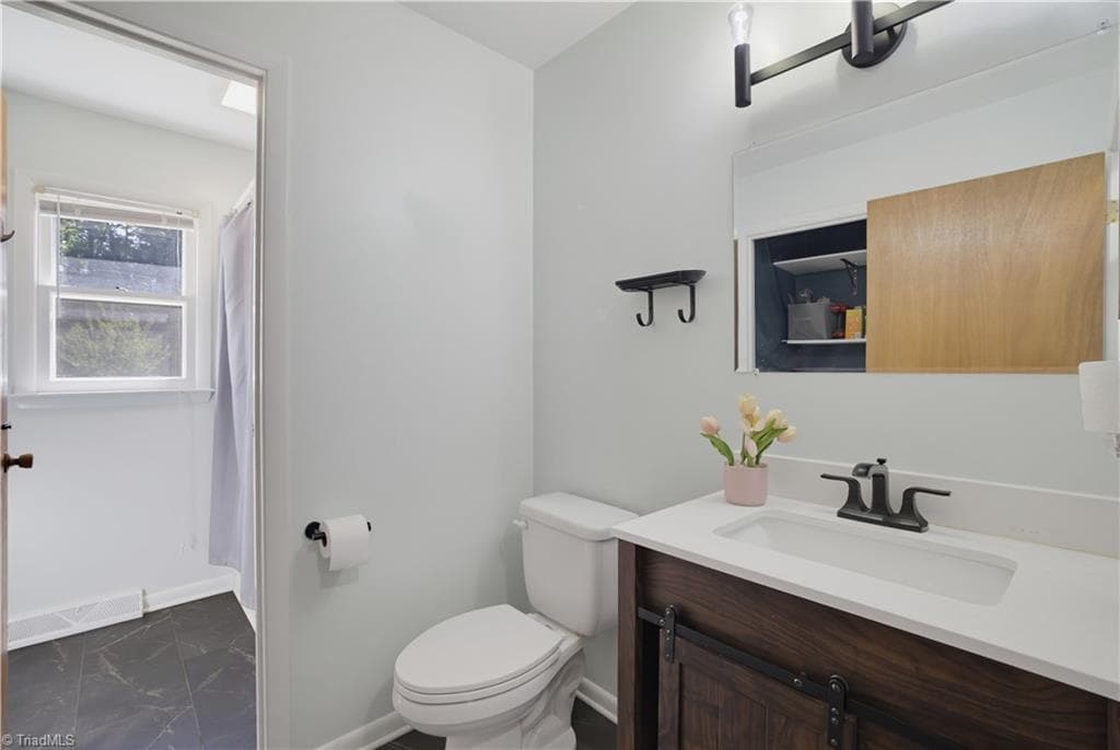 Stick/Site Built at 8009 Tam Oshanter Drive, Greensboro NC 27409, photo 20 of 27