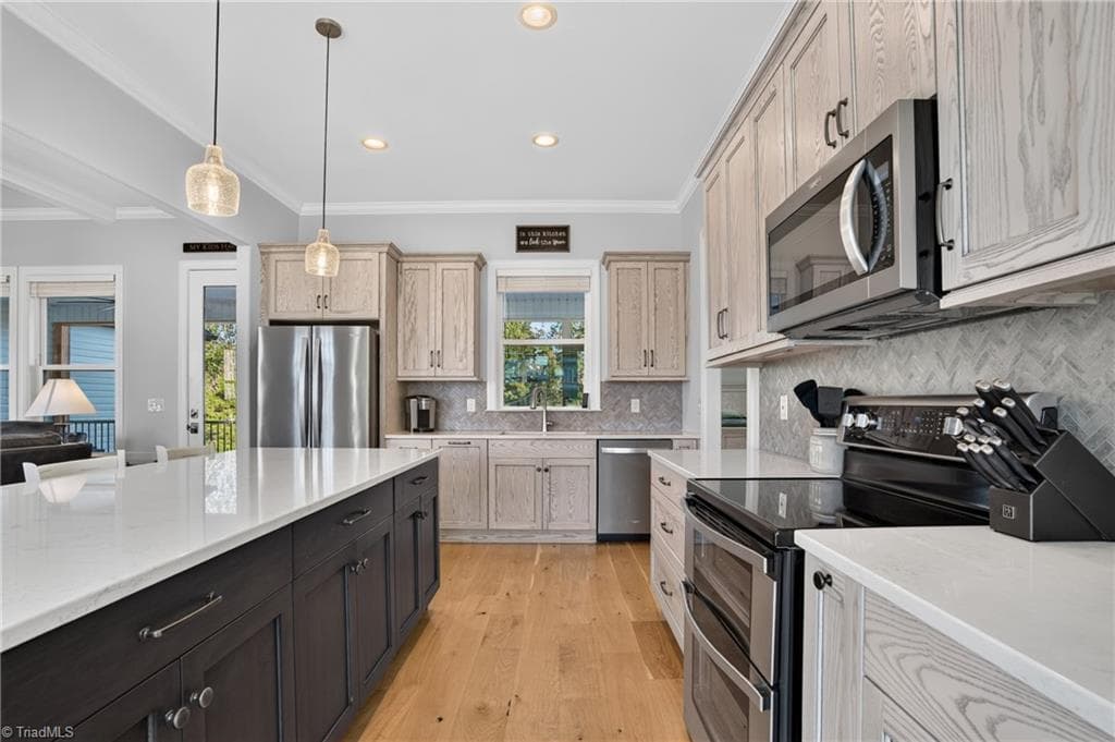 Dark island against light cabinetry, nice contrast - 117 Scenic View Trail, Madison NC 27025, Madison