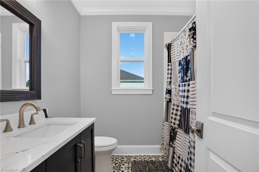 Vanity with a framed mirror and good light - 117 Scenic View Trail, Madison NC 27025, Madison