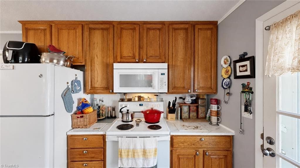 Here you see the range, fridge and built in microwave, all remain - 1823 Bantry Trail, Kernersville NC 27284, Kernersville