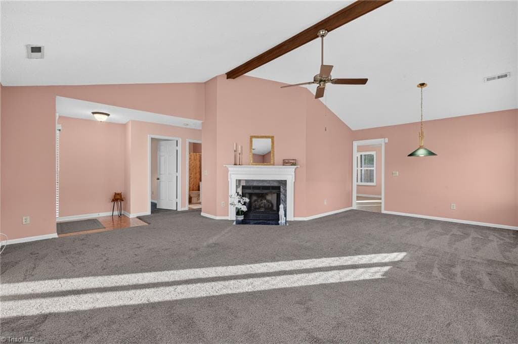 The open layout allows the living spaces to flow easily from one area to the next. - 4407 Cove Cay Lane, Greensboro NC 27410, Greensboro