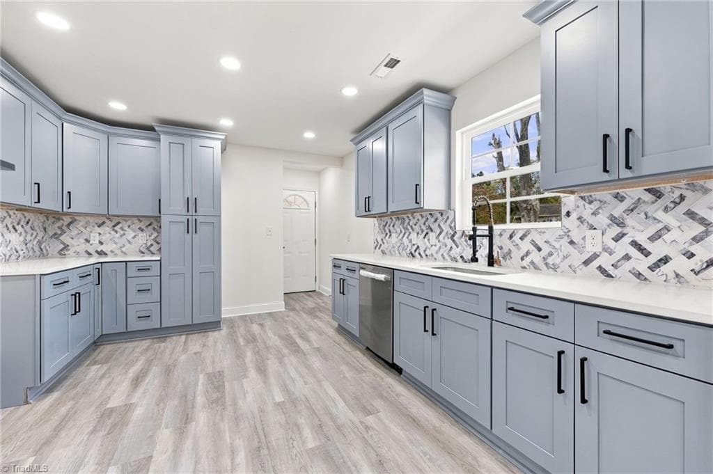 kitchen with access to carport, basement, and bonus room - 1524 Mcguinn Drive, High Point NC 27262, High Point