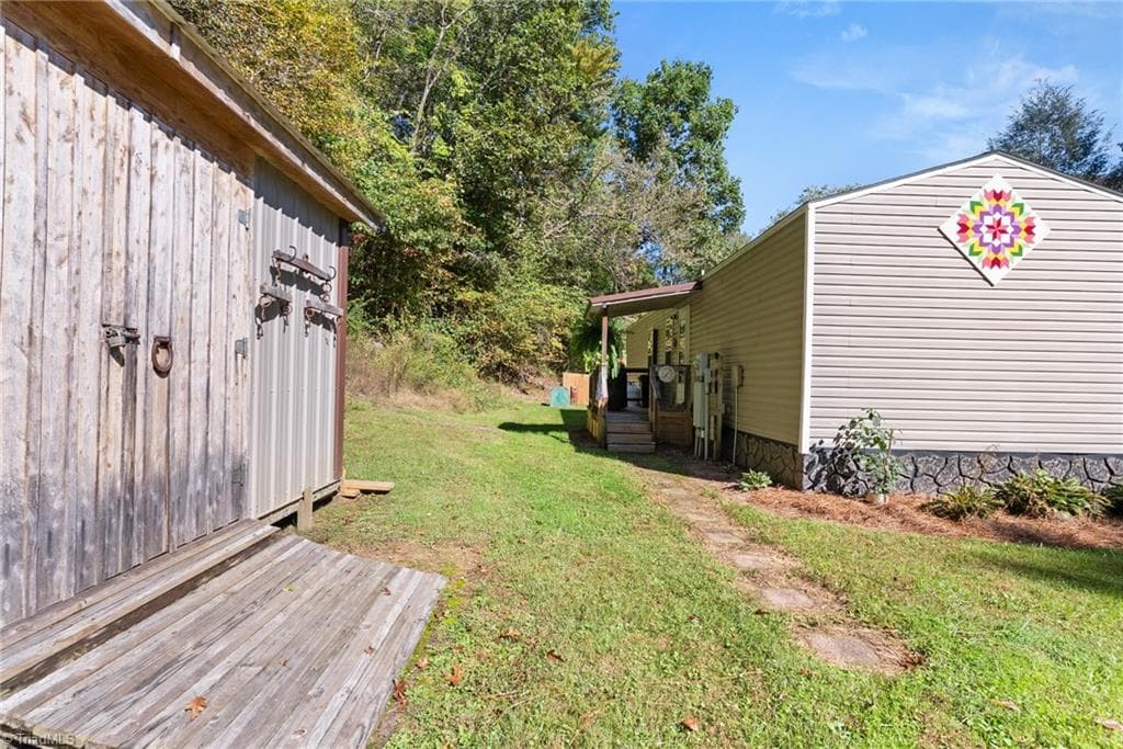 Manufactured Home at 99 Lynn Lane, Glade Valley NC 28627, Glade Valley, photo 31 of 45